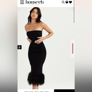 Beautiful houseofCB feathered black dress. Size small.